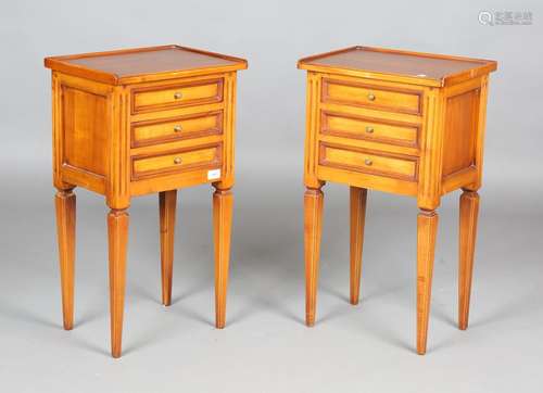 A pair of French cherry bedside tables