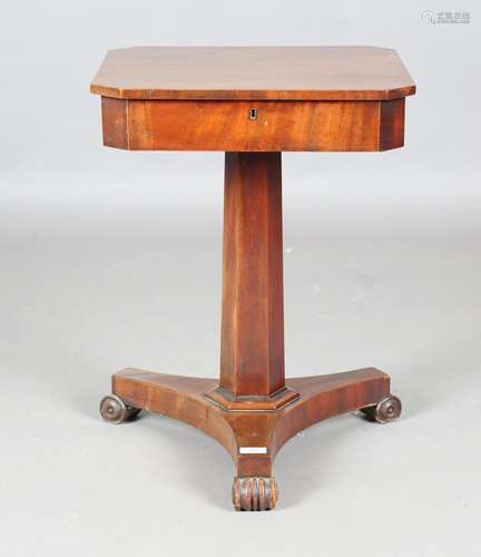 An early Victorian mahogany canted square writing table