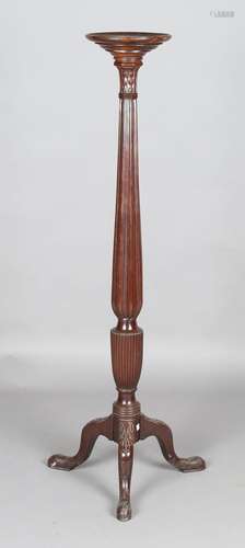 A George III mahogany bedpost torchère