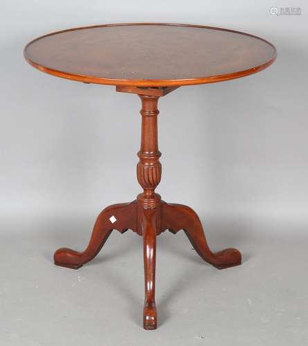 A modern George III style hardwood tip-top supper table