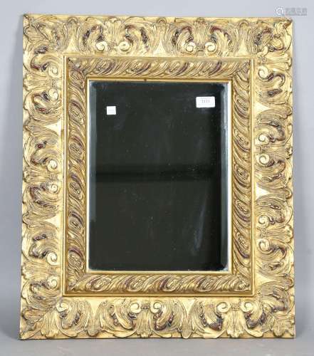 A modern gilt composition wall mirror with bevelled glass