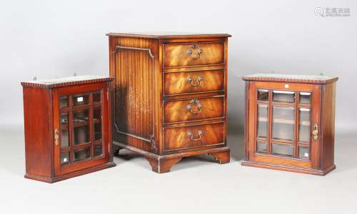 A pair of late Victorian mahogany hanging wall cabinets