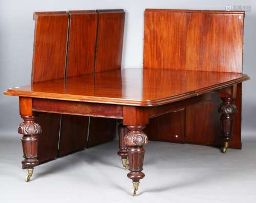 A large mid-Victorian mahogany extending dining table