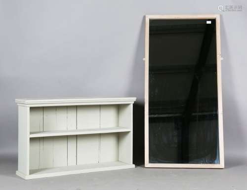 A 20th century limed pine rectangular wall mirror