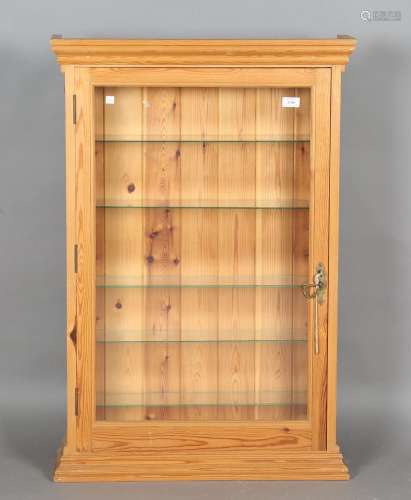 A modern pine shallow wall display case