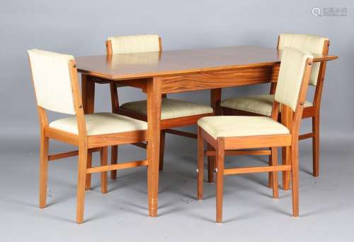 A mid-20th century teak extending dining table by Gordon Rus...