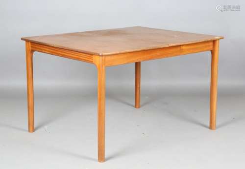 A mid-20th century retro teak extending dining table by A.H....