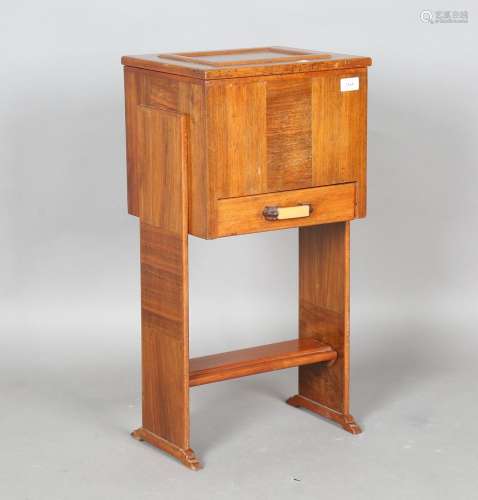 An Art Deco walnut sewing table