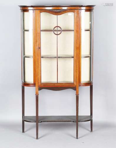 An Edwardian mahogany and boxwood inlaid display cabinet wit...