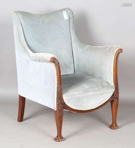 An Art Nouveau mahogany showframe armchair