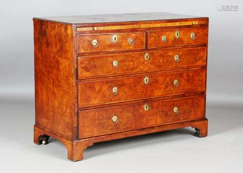 A George I burr walnut chest of oak-lined drawers