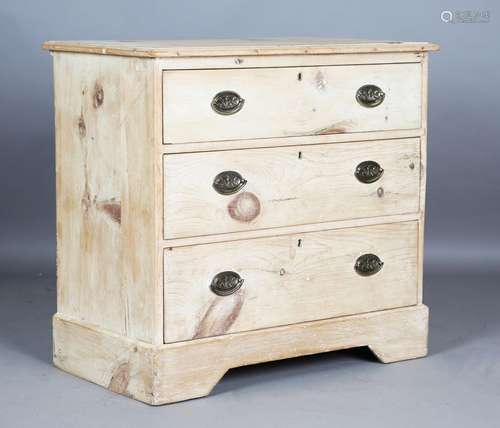 A 19th century stripped pine chest of three drawers