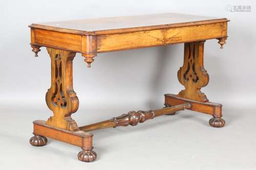 A Victorian walnut stretcher table