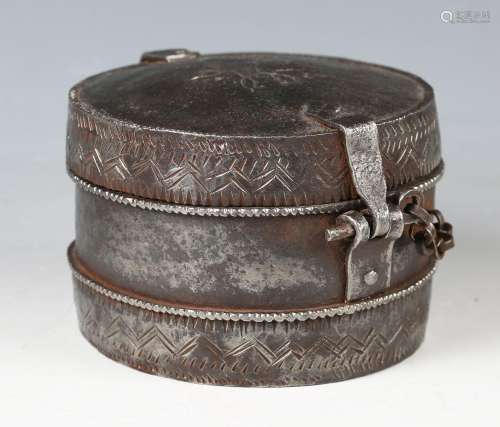 A Nuremberg style patinated steel circular casket