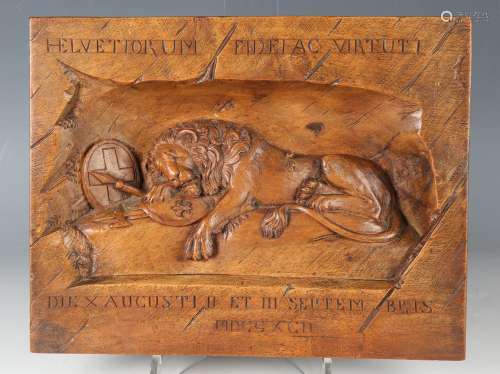 An early 20th century Continental walnut plaque