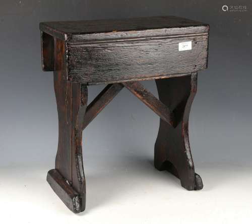 A 19th century provincial stained pine hearth stool