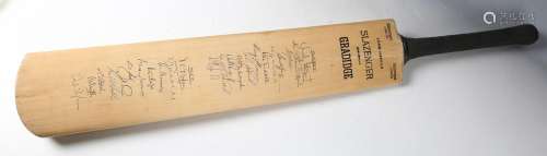 A signed Slazenger 'Gradidge' cricket bat