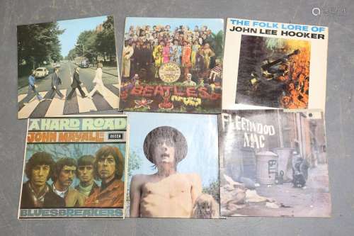 A collection of twenty-nine LP records