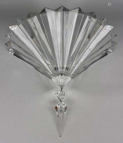 A contemporary Baccarat Crystal Mille Nuits wall sconce