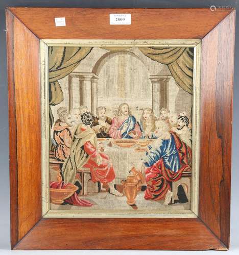 A 19th century Berlin woolwork panel depicting the Last Supp...