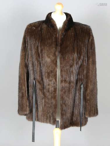 A late 20th century mink half-length coat by Saga with appli...