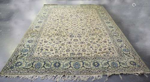 A signed Kashan carpet