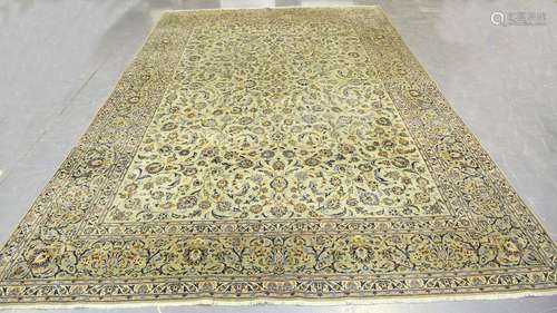 A signed Kashan carpet