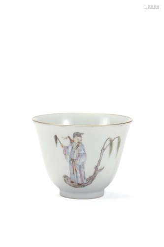 A Porcelain Figure And Sea Waves Cup