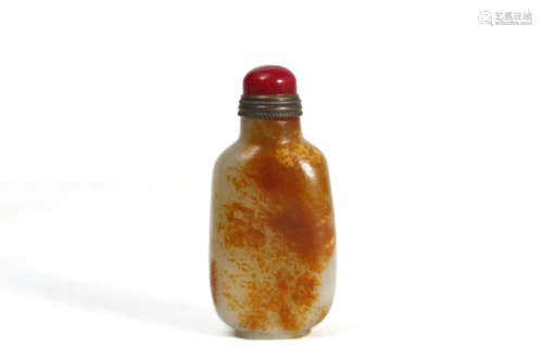 A Russet Jade Inscribed Snuff Bottle