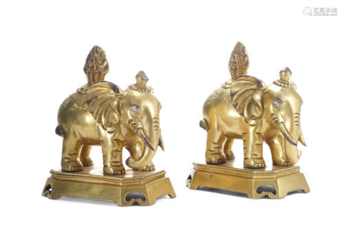 A Pair Of Gilt Bronze Elephants