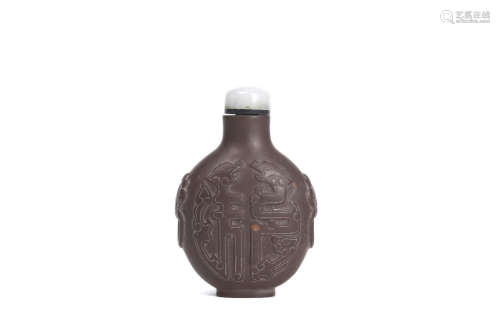 A Duan Stone Dragon Inscribed Snuff Bottle