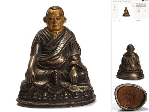 A Gold-Decorated Silver Buddhist Figure