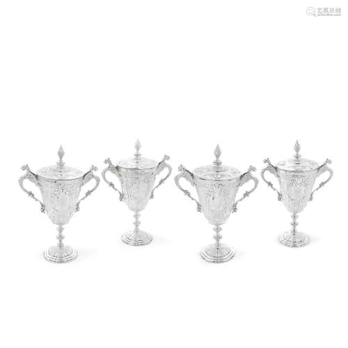 A SET OF FOUR VICTORIAN TWO-HANDLED PRESENTATION CUPS James ...