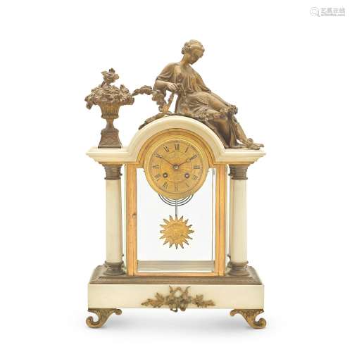 AN ORMOLU AND MARBLE MANTEL CLOCK Late 19th / early 20th cen...