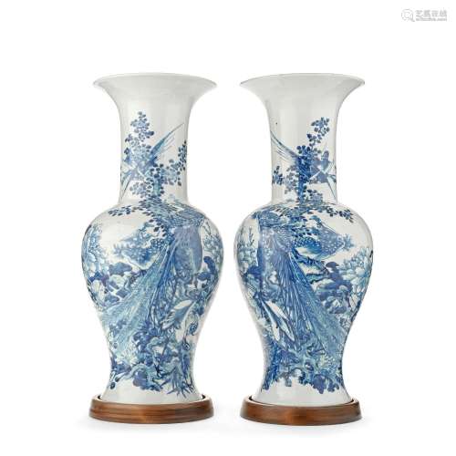 A PAIR OF CHINESE BLUE AND WHITE 'PEACOCK' VASES Late Qing D...