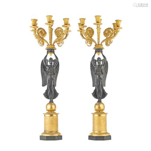 A PAIR OF 19TH CENTURY FRENCH GILT AND PATINATED BRONZE FIGU...