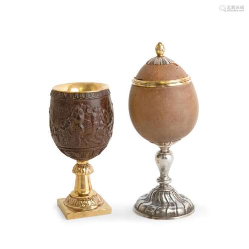TWO CONTINENTAL SILVER-MOUNTED COCONUT CUPS Both with indist...