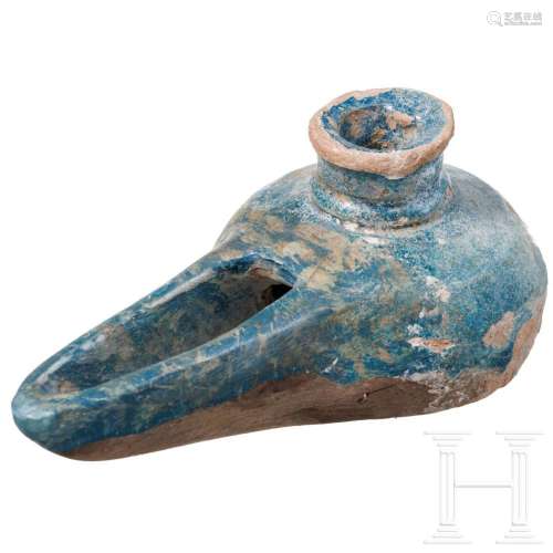 A selcuk pottery oil lamp, 14th - 16th century