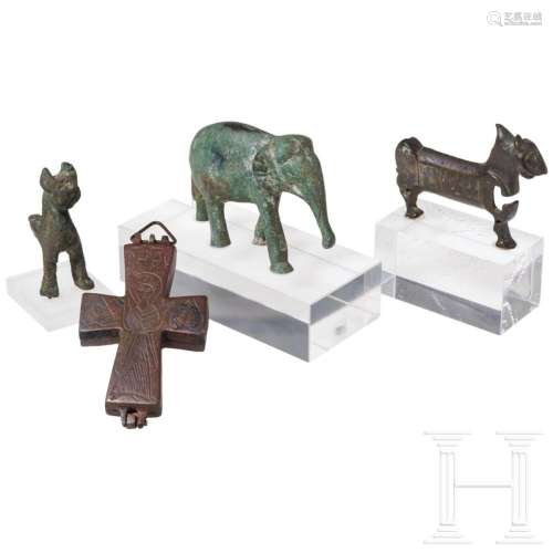 Three oriental bronzes in the shape of animals, in addition ...