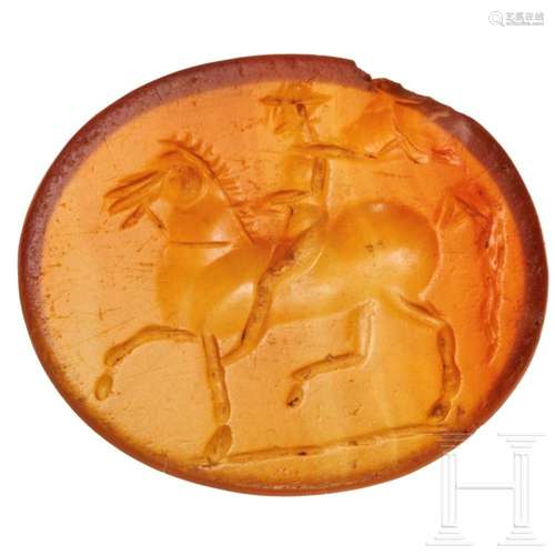 A Greek carnelian gem with rider, 4th - 3rd century B.C.