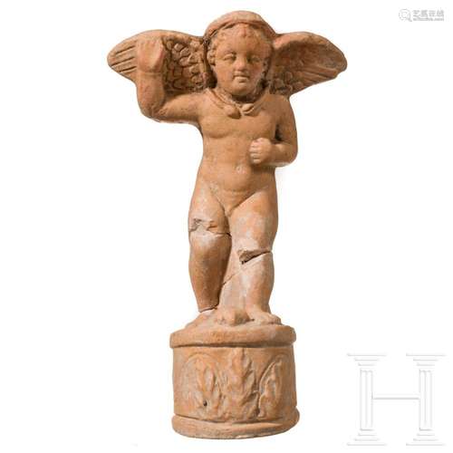 A Hellenistic terracotta figure of a walking cupid, 2nd - 1s...