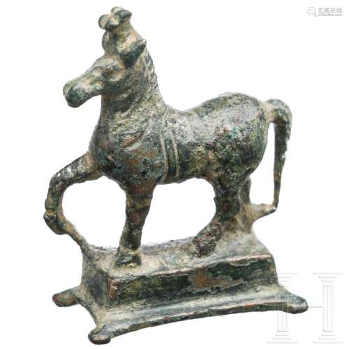 A Roman bronze miniature statuette of a horse, 2nd - 3rd cen...