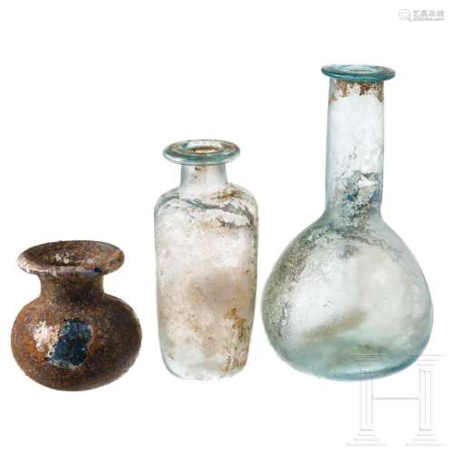 Three Roman glass vessels, 2nd - 4th century