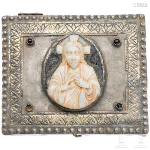The lid of an early Byzantine silver reliquary with a cameo ...