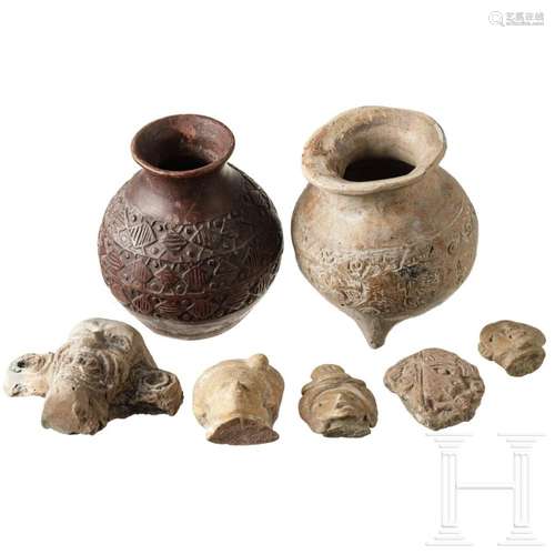 Two pre-Colombian vessels and five terracotta heads