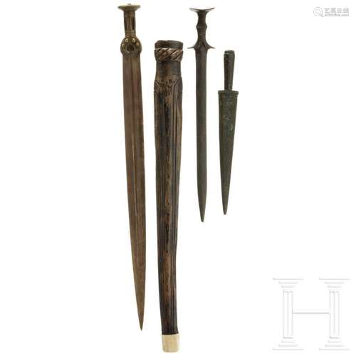 Three replicas of Bronze Age blank weapons