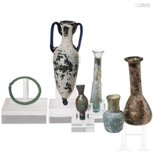 Five ancient glass vessels and a glass bracelet, 2nd century...