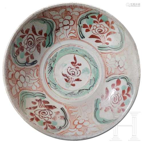 A large Swatow ware (Zhangzhou) dish with flowers, probably ...