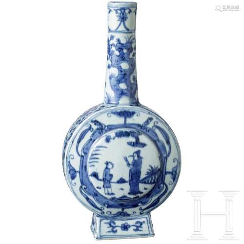 A blue and white glazed bottle with depictions of an officia...