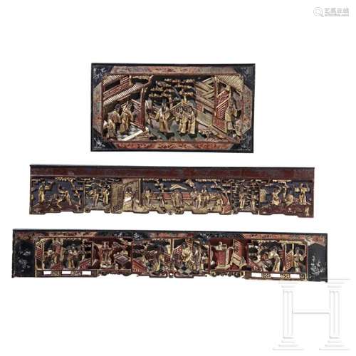 Three lacquered Chinese high relief panels, late 19th centur...